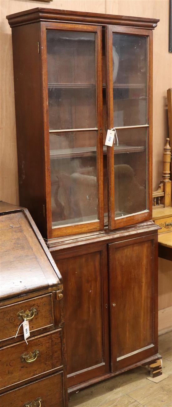A Victorian mahogany glazed cabinet of narrow proportions H.181cm